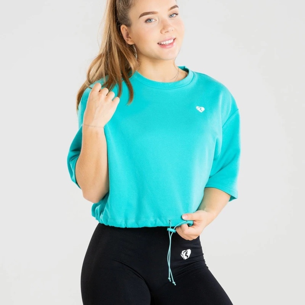 women’s best power crop top in turquoise